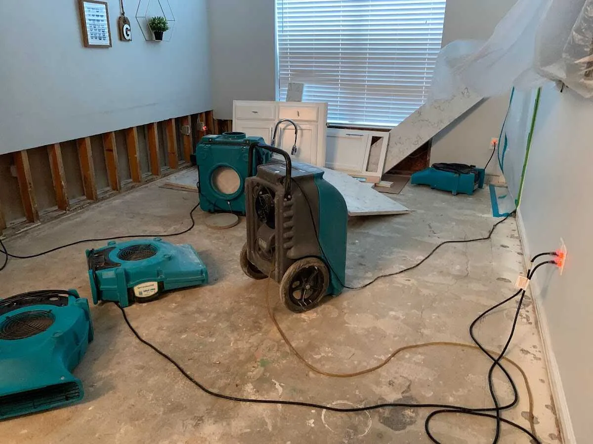 Dehumidifier in flood-cut room for Water Damage Restoration in Vail